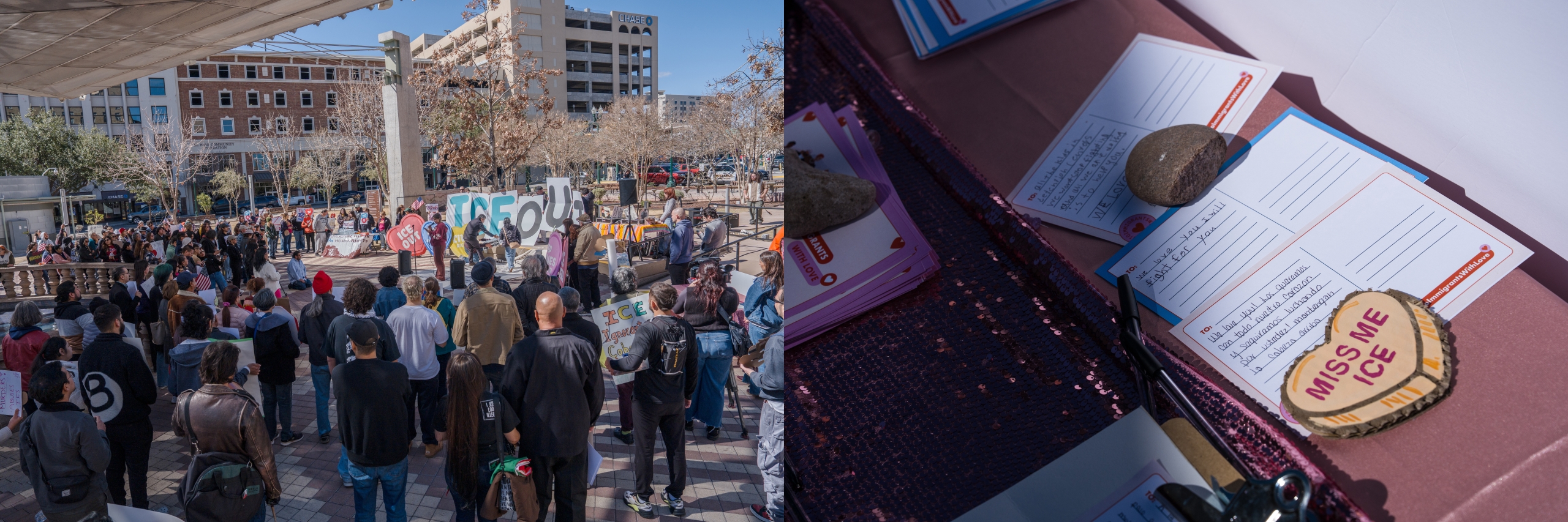 A large crowd of people gathers in an urban plaza for an outdoor demonstration. Activists hold large cutout letters spelling "ICE OUT" and carry signs in front of a speaker system, with surrounding city buildings visible in the background.
Several postcards with handwritten supportive messages rest on a pink tablecloth, held down by smooth stones.