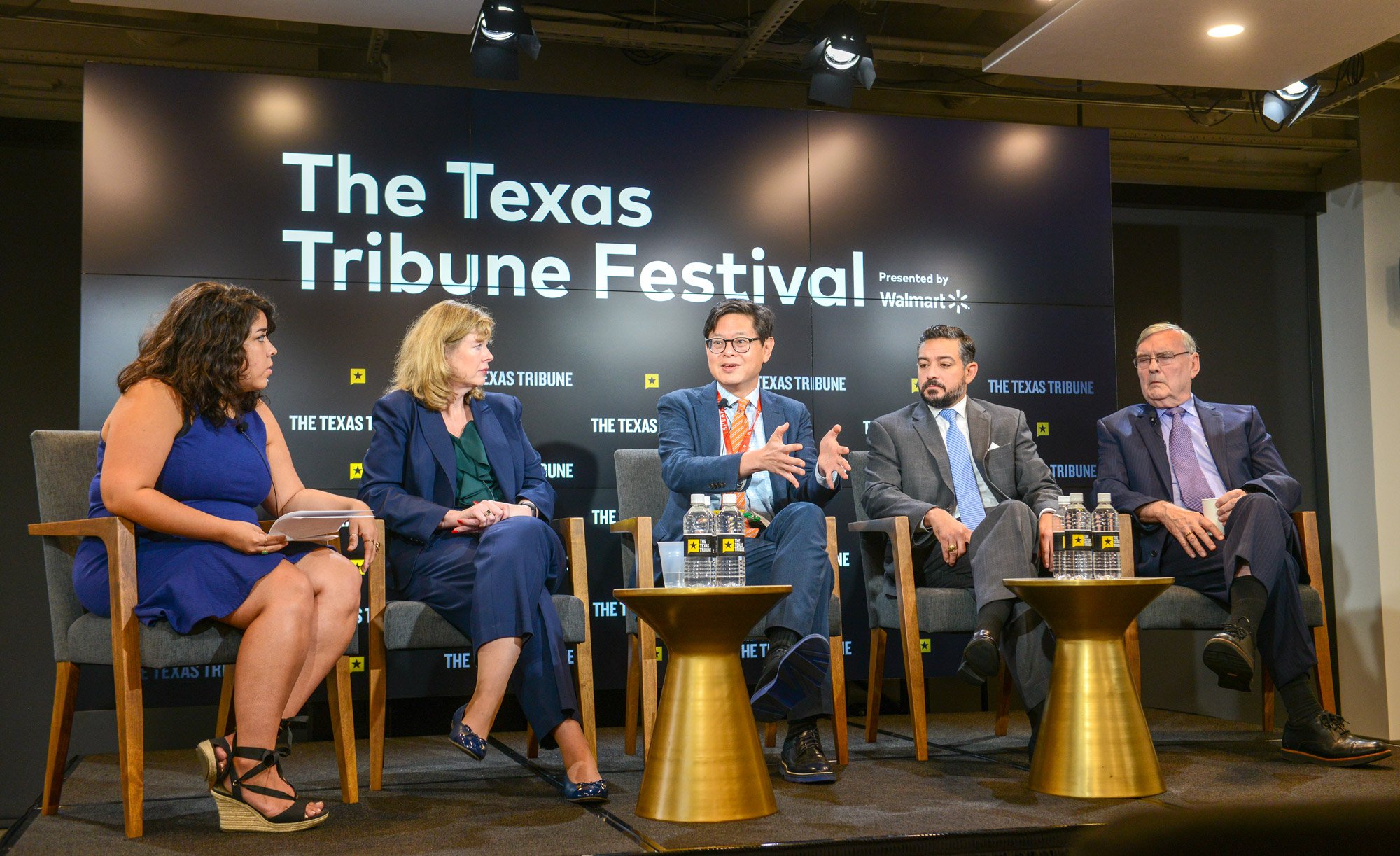 A 5 person panel on stage in Studio 919 with wireless microphones from the 2018 Texas Tribune Festival