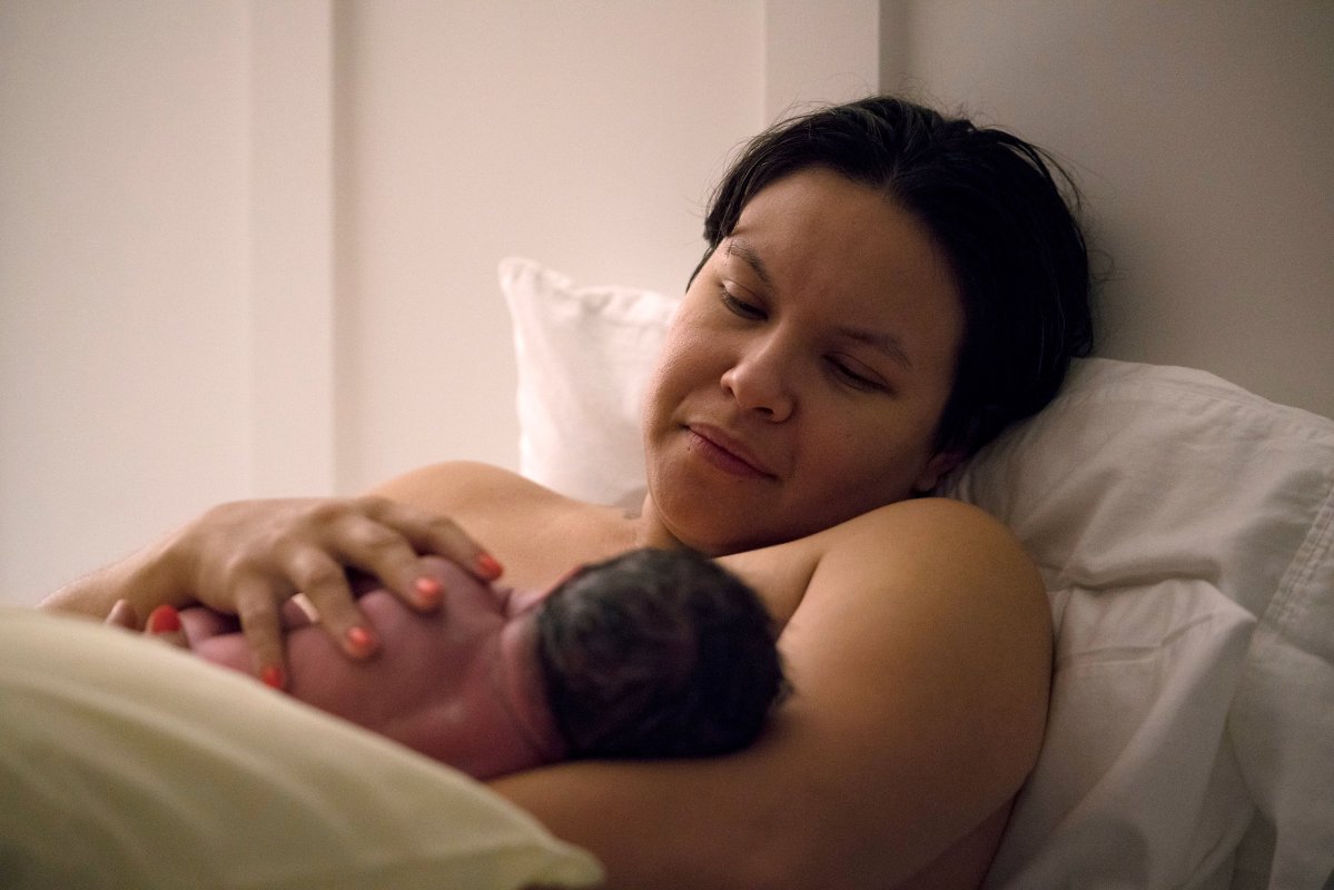 Arika Rodriguez feeds her son, Parker, after giving birth at the Holy Family Birthing Center in Weslaco.