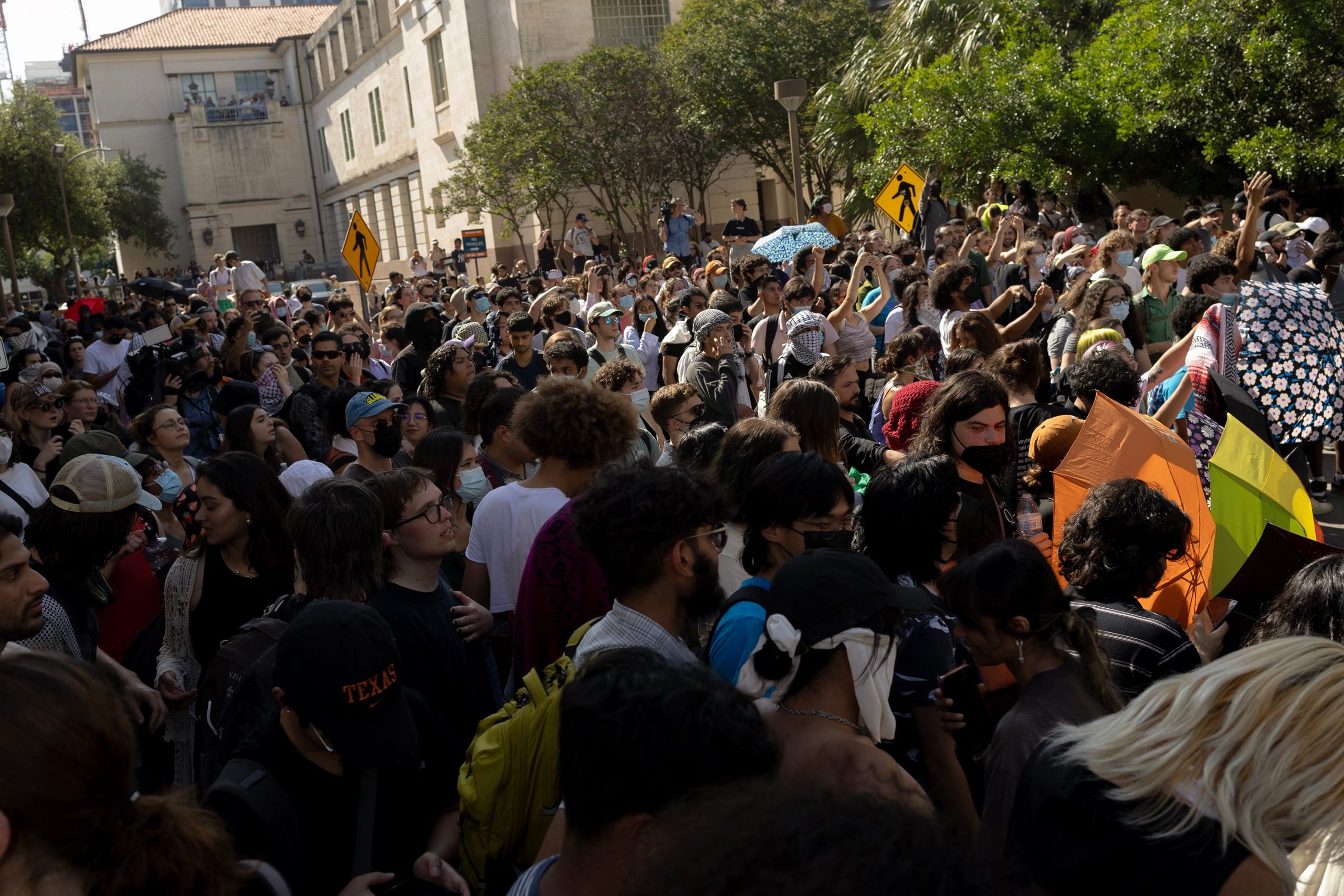 Protesters chant “off our campus” at law enforcement during a pro-Palestinian demonstration at the University of Texas at Austin on April 29, 2024.