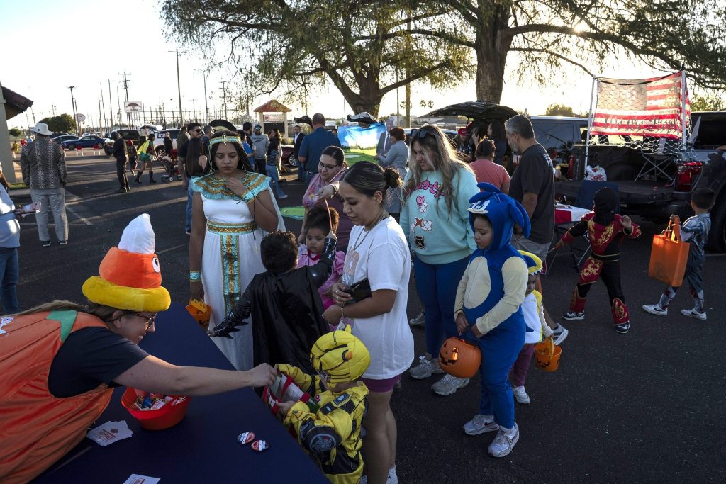 People take part in the &ldquo;Trunk or Treat&rdquo; community event at the Hidalgo County Republican Party Headquarters in McAllen on Oct. 30, 2025.