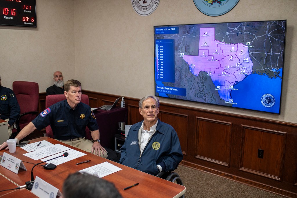 Nym Kidd, chief of the Texas Division of Emergency Management, and Gov. Greg Abbot at a briefing and press conference on the winter storm approaching Texas on Thursday, Jan. 22, 2026, in Austin.