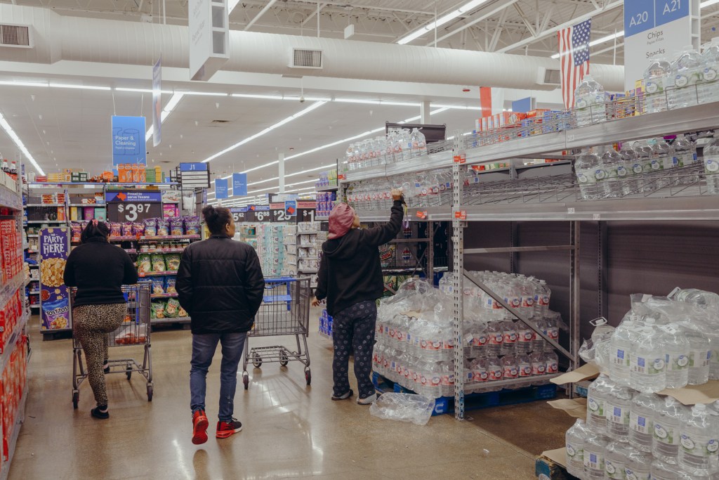 Austinites gathered supplies for the winter freeze at a Walmart on Friday.