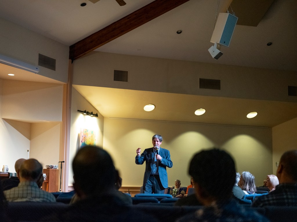 St. Andrew's Presbyterian Church Pastor Jim Rigby delivers a sermon during service in Austin.