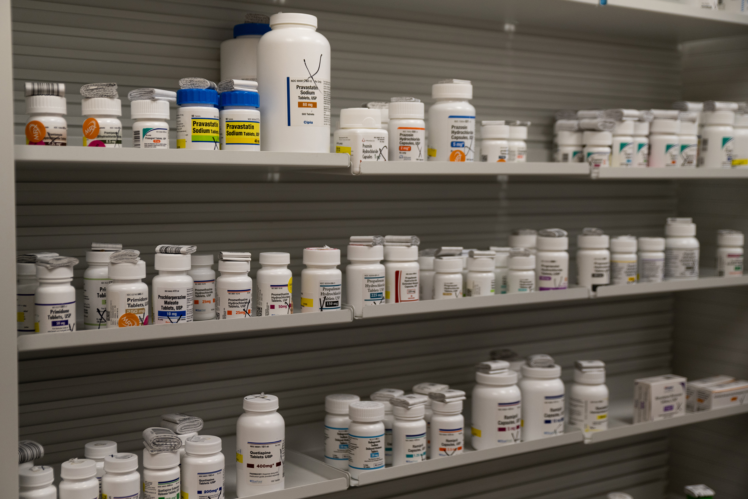 A collection of stock bottles, used to fill individual prescriptions, on shelves at Hyland's Pharmacy in Wheeler on March 21, 2026.