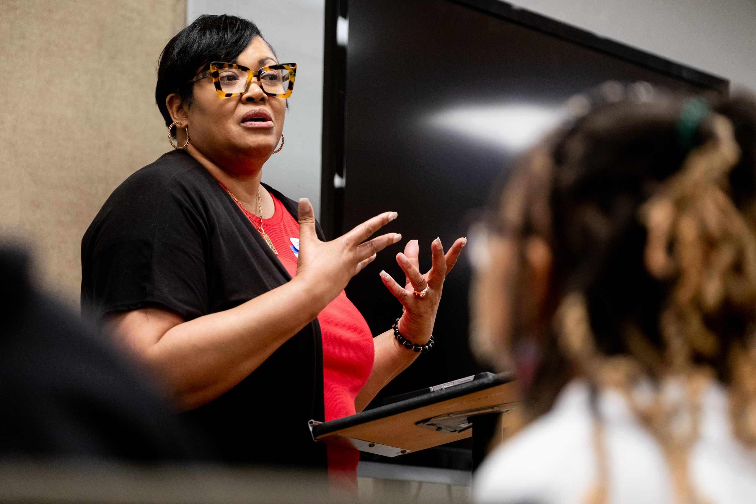 Veronica Gaston speaks about her experience of being a single mother and finding her love relationship with God during a SHINE community support group meeting for mothers at Marvin Methodist Church in Tyler.