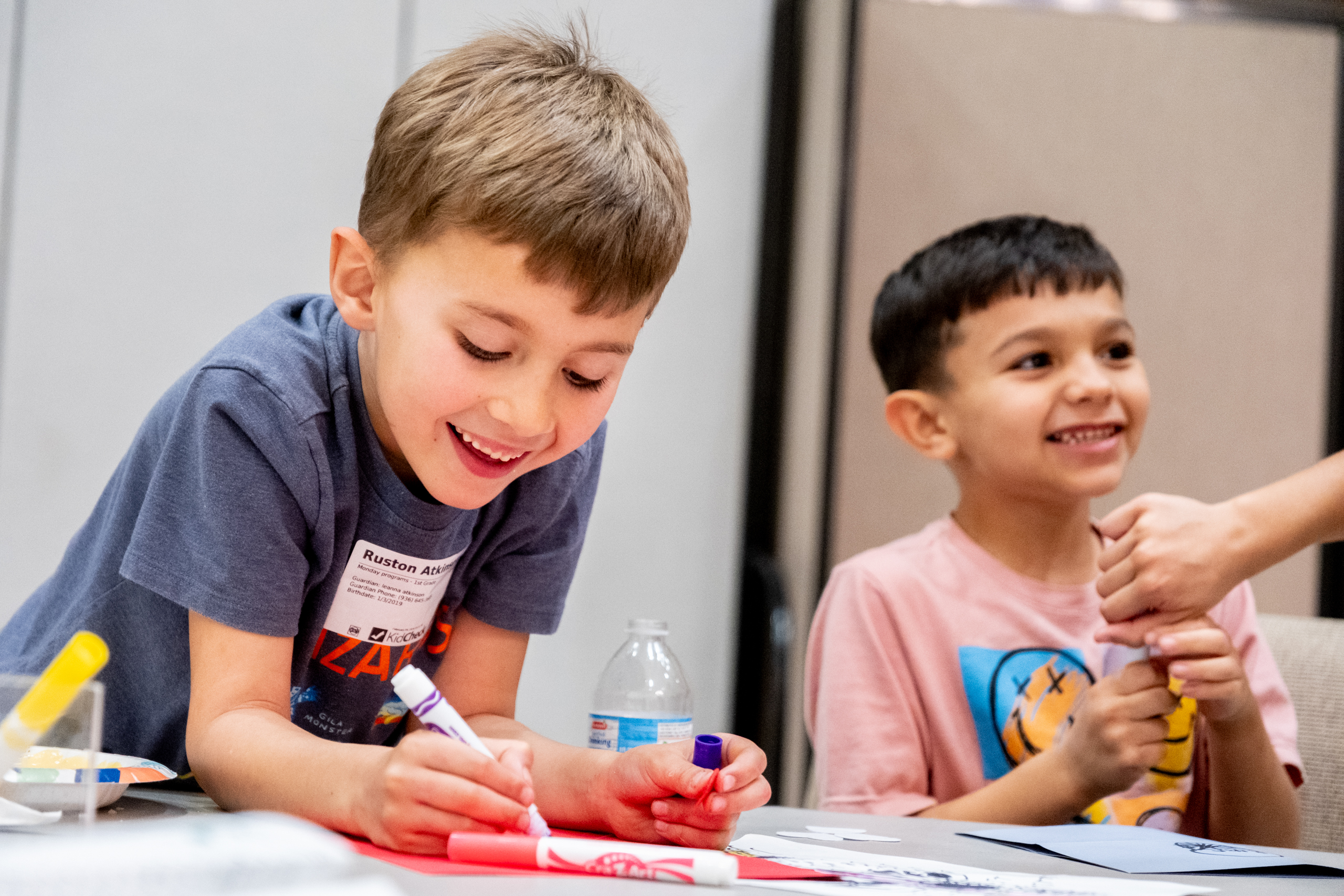 Ruston Atkinson spends his evening making Valentine's cards as his mother attend a SHINE community support group meeting for mothers on Feb. 9, at Marvin Methodist Church in Tyler.