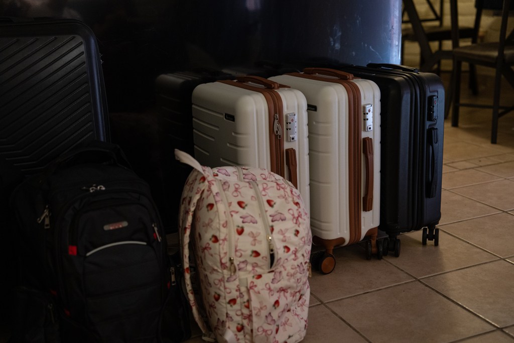 Luggage belonging to a Venezuelan family who are self deporting back to Venezuela sits in an apartment where they are staying with friends in Las Cruces, New Mexico on Sunday, April 12, 2026.