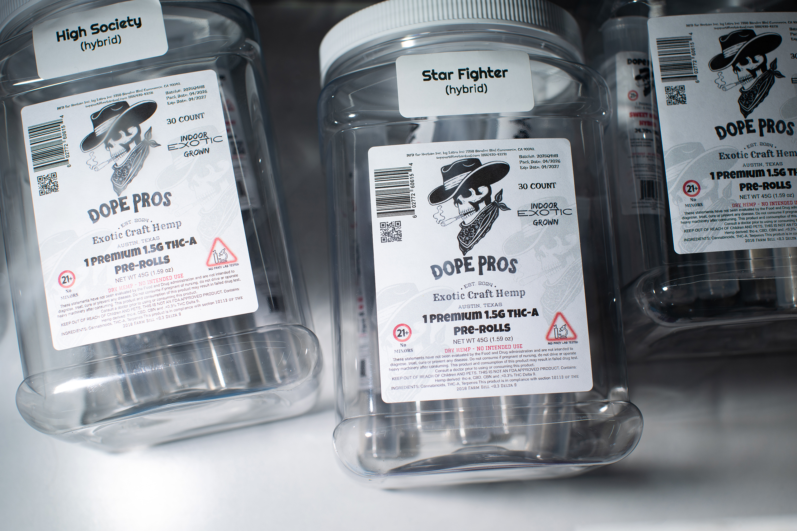 Individual packages of pre rolls in a display case at an Austin smoke shop on May 13, 2026.
