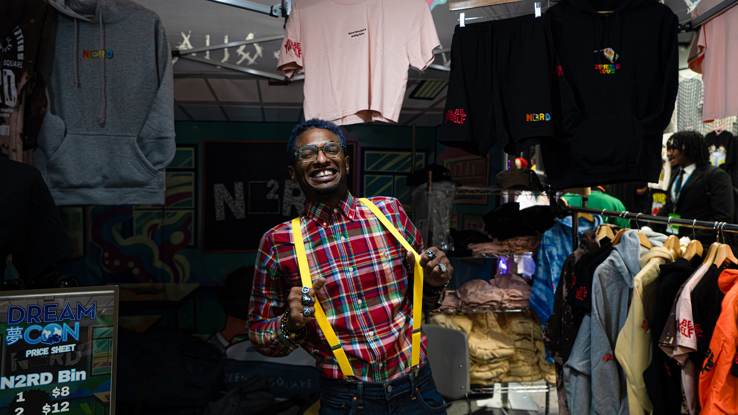 Jahlil attended Dream Con 2026 in Houston via Atlanta and is one of the many vendors on display during the three day event. Jahlil says “There aren’t enough space like this for people of color, but they’re growing” . Saturday, July 11, 2026, in Houston. (Douglas Sweet Jr / The Texas Tribune)