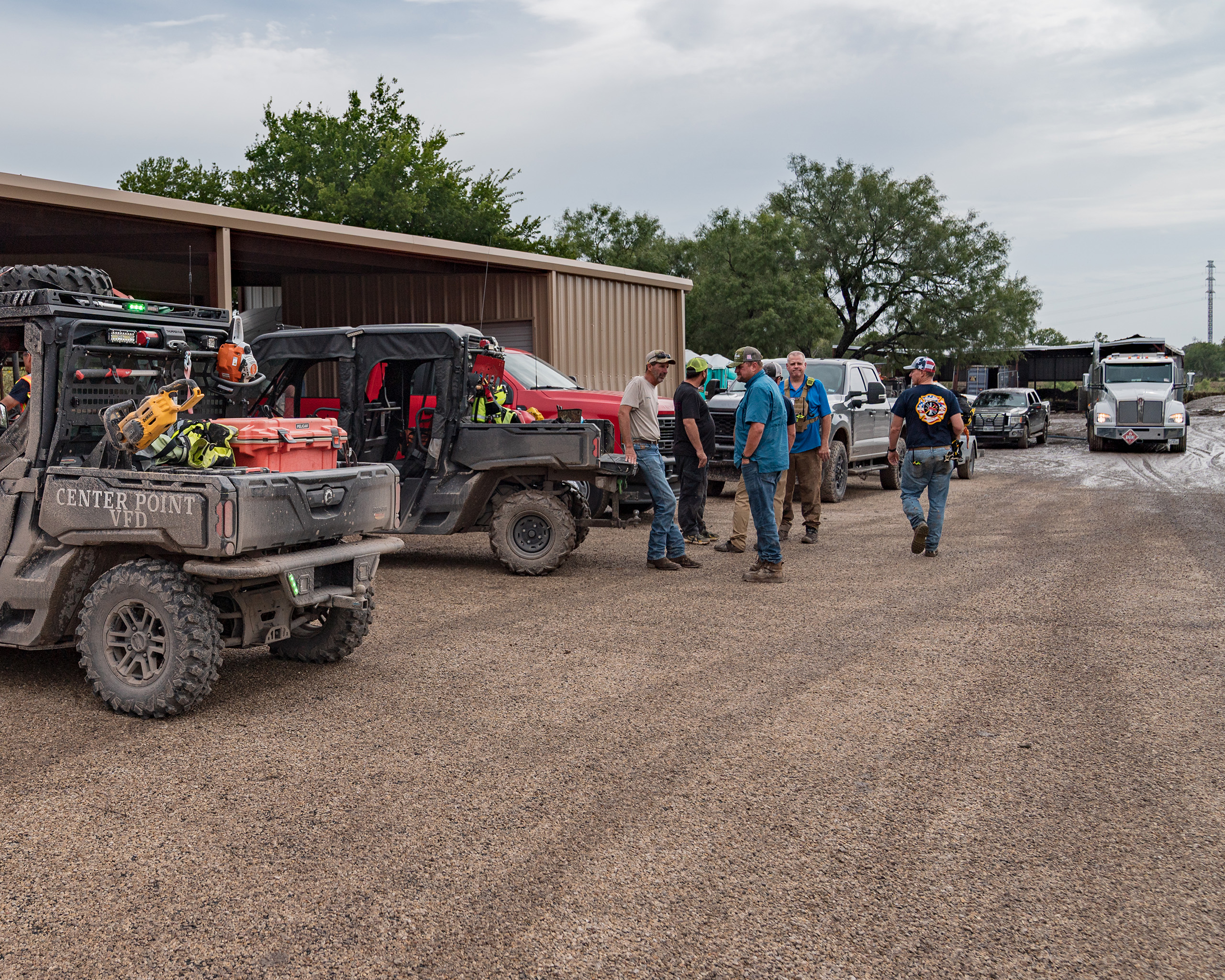Volunteers gather outside the Center Point Volunteer Fire Department station on July 17, 2026.