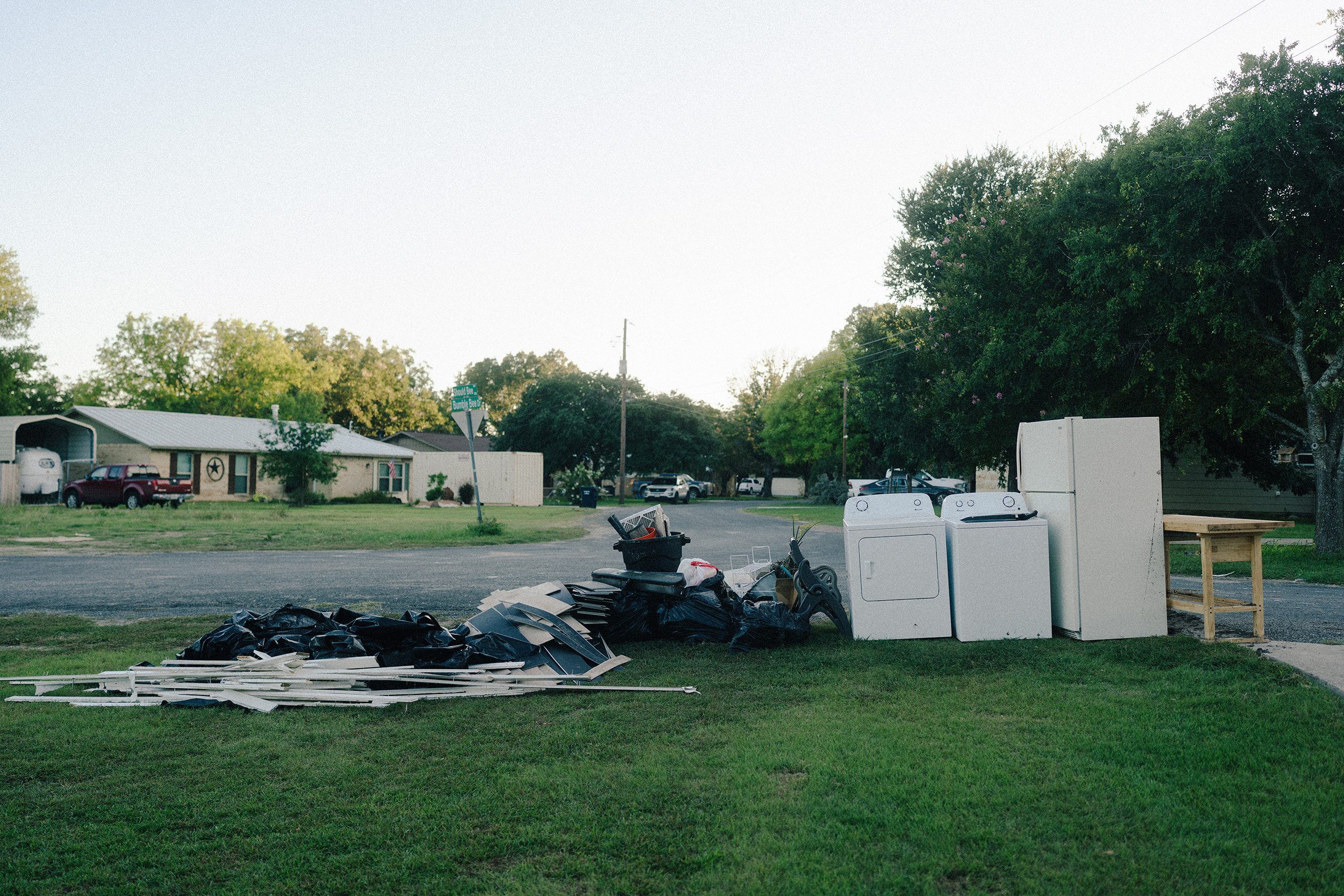 Joan Connor and David Stearns’ damaged belongings outside of their home that flooded during the 2025 flood and the July 16, 2026 flood in Hunt, Texas on July 26, 2026.