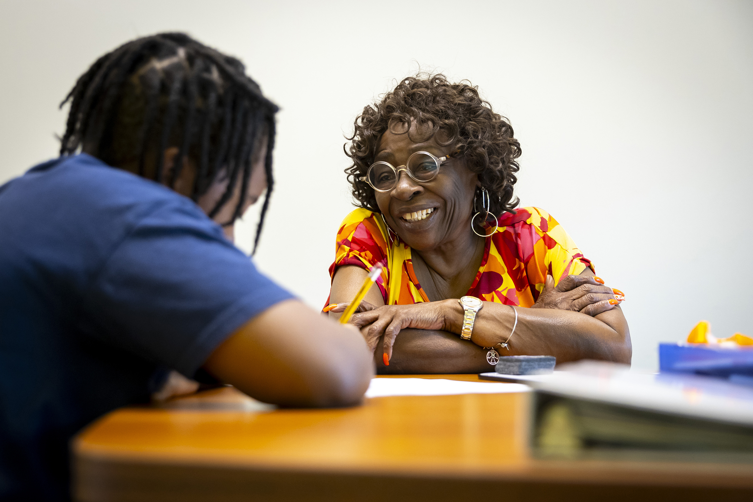 Retired educator Arleen Woodson tutors incoming sixth grader Jaleel Montgomery, 11, at the Missouri City Branch Library on Thursday, Aug. 6, 2026, in Missouri City.