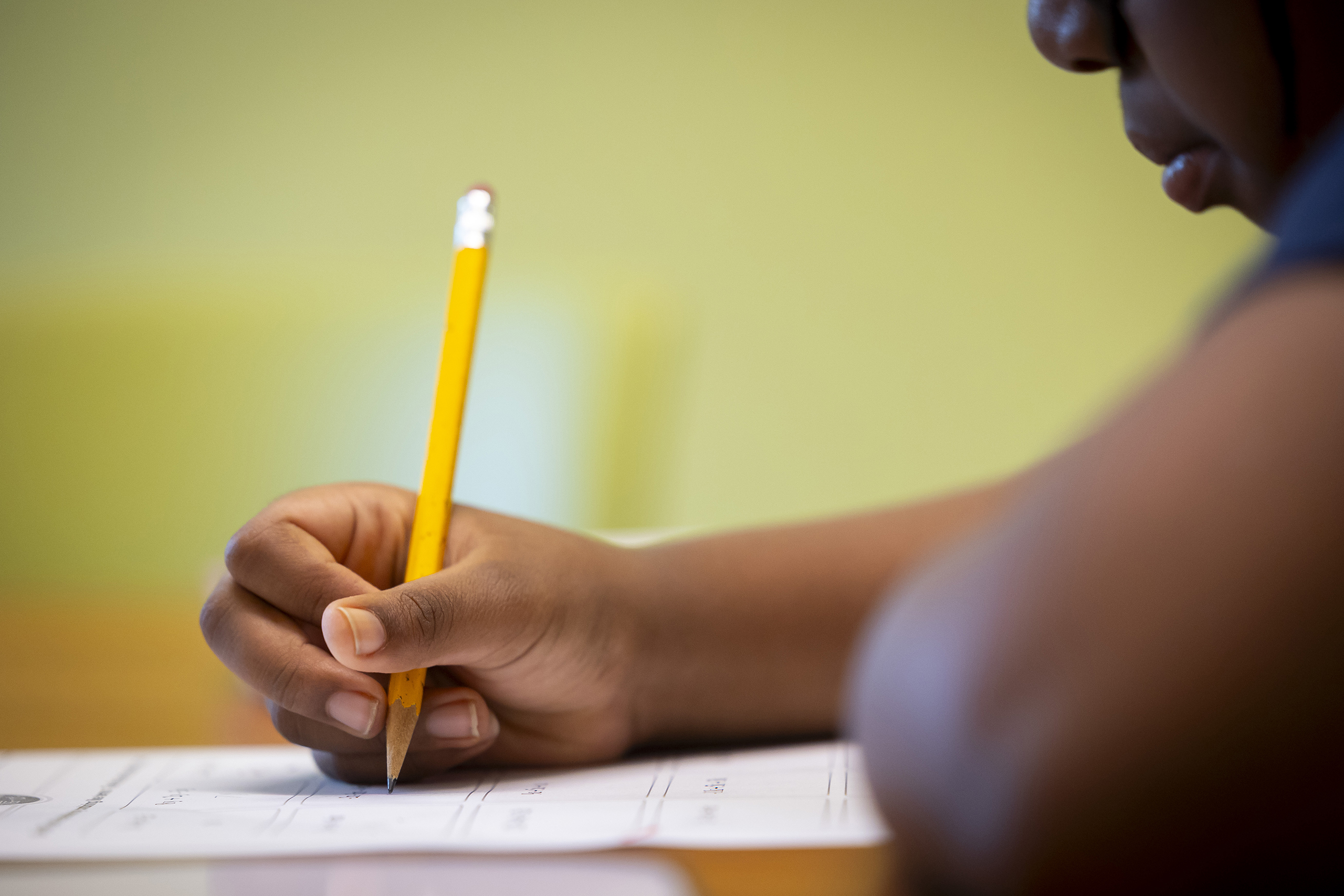 Jaleel Montgomery, 11, works through a math equation during a tutoring session at the Missouri City Branch Library on Thursday, Aug. 6, 2026, in Missouri City.