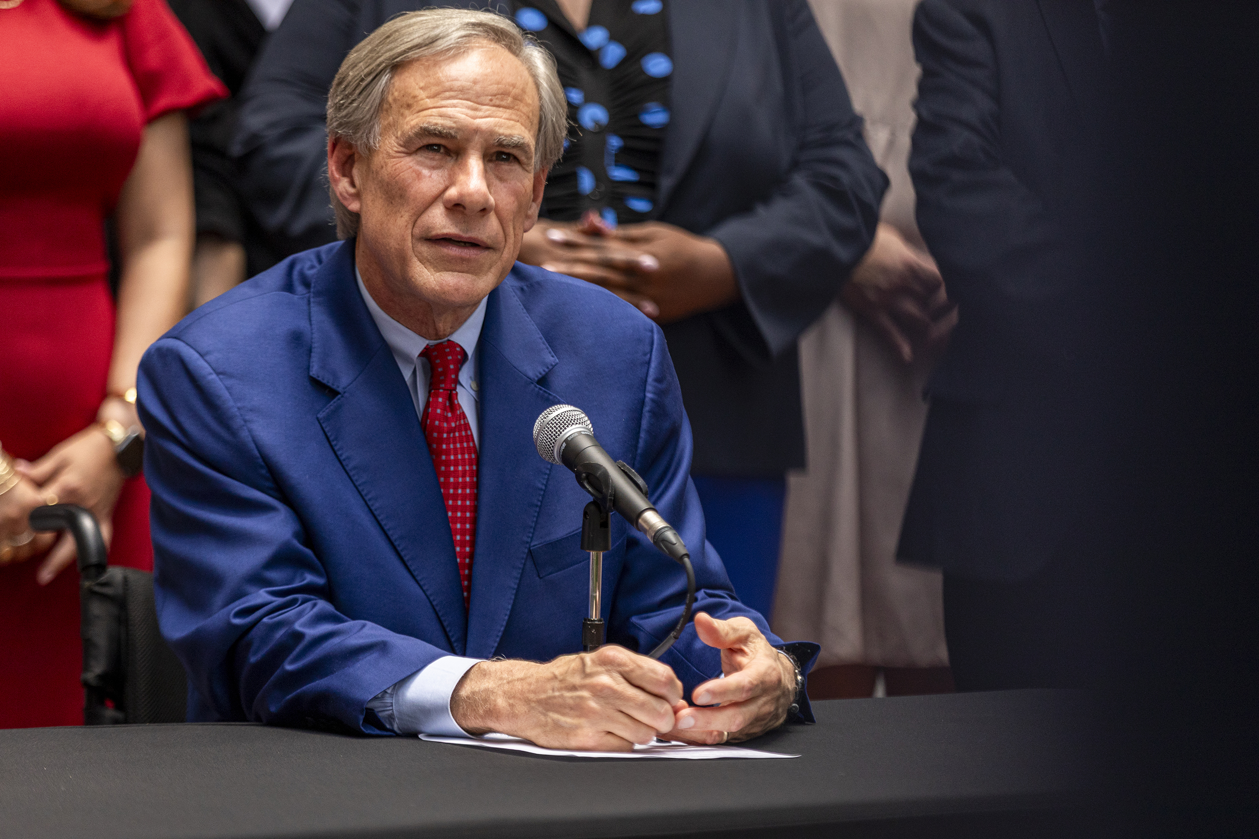 Gov. Greg Abbott answers questions from the media during a press conference in Austin on Aug. 10, 2026.