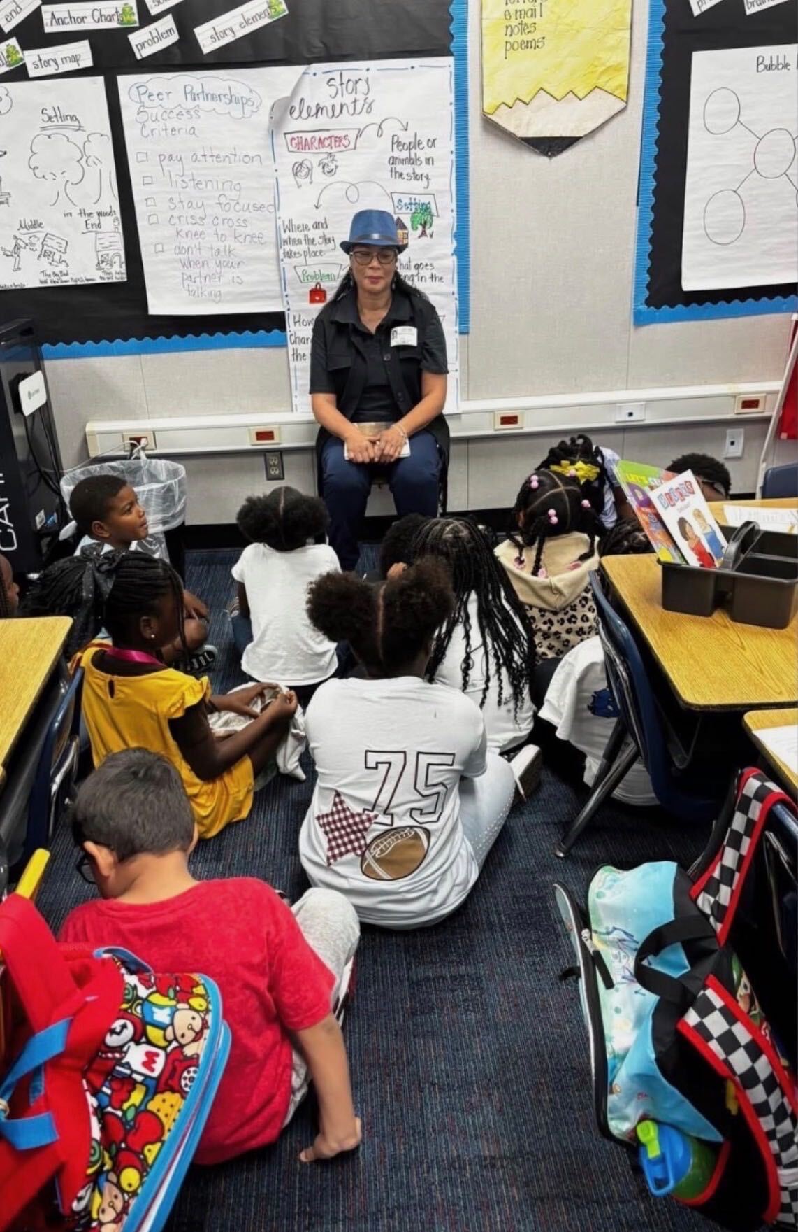 Stephanie Brown interacting with children at Edgar Glover Jr. Elementary, a majority-Black school in Fort Bend ISD. Brown's three children graduated from the district, in which she has volunteered and advocated for more than two decades.