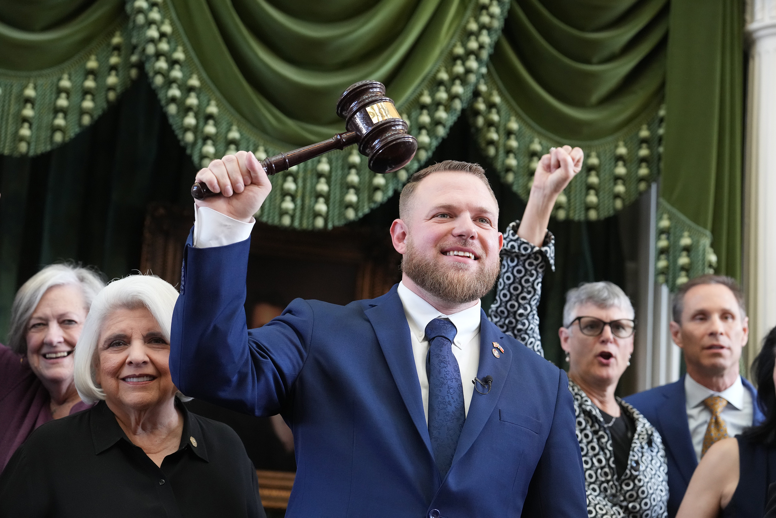 Newly sworn-in state Sen. Taylor Rehmet is joined by Democratic colleagues in the Senate Chamber in Austin on Feb. 19, 2026.